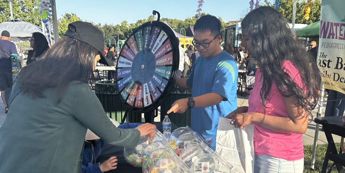 People volunteering at community charity event