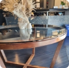 Table with glass top in reception area