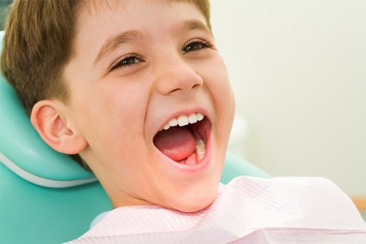 Patient in Blackhawk smiling during checkup