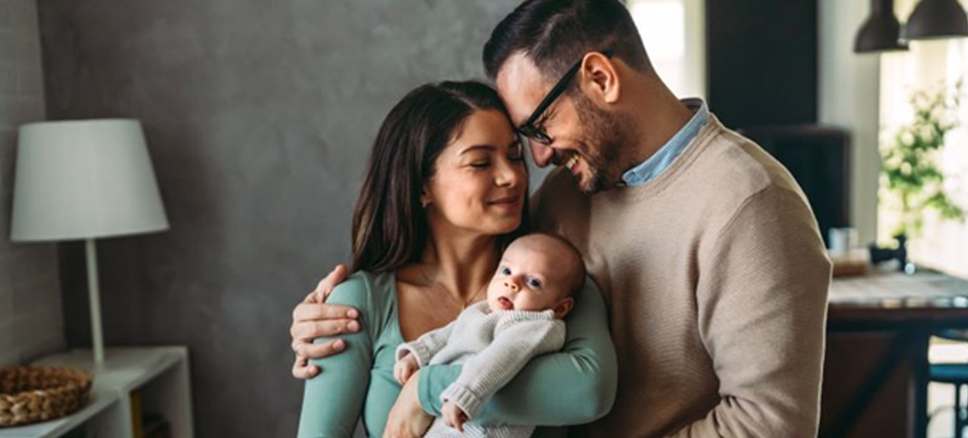 Happy parents with their newborn baby